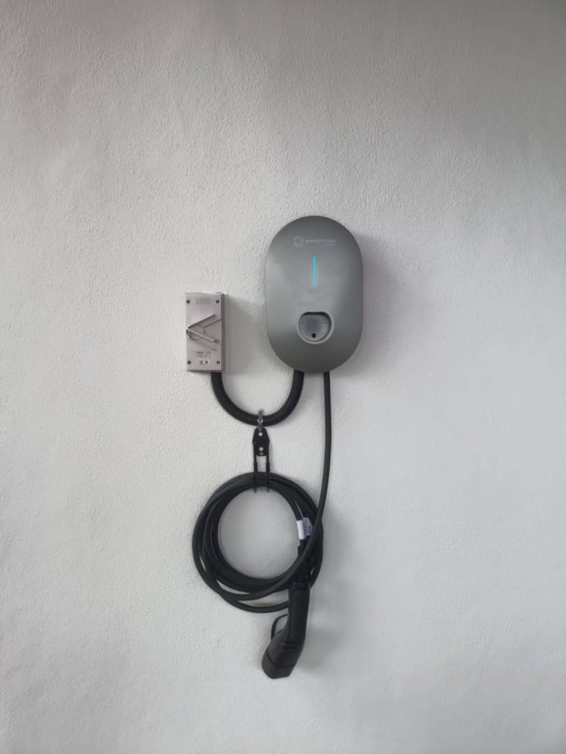 Wall-mounted EV charger
